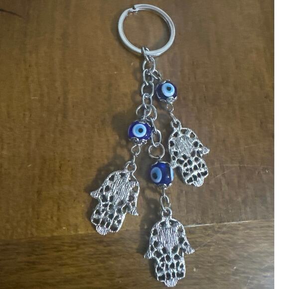 I bought this in Israel This is a Hamsa Hand and Evil Eye keychain 4 protection - Picture 2 of 3